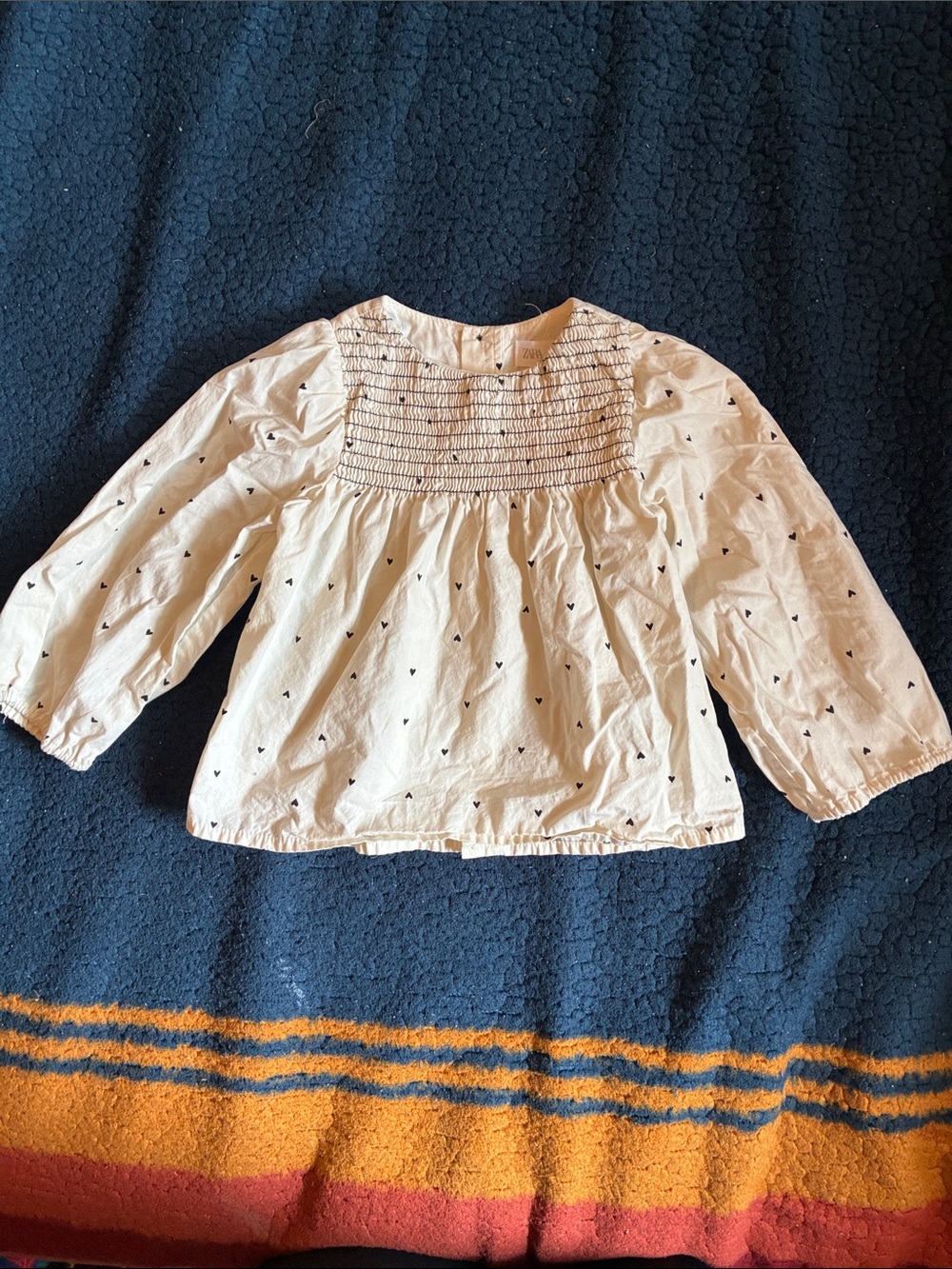 NWOT Zara Cream Smocked Blouse with Black Heart Print